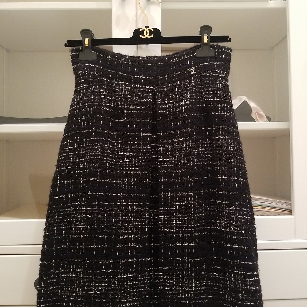 Chanel tweed skirt. All 4 colors threads of , blue, cream and silver.